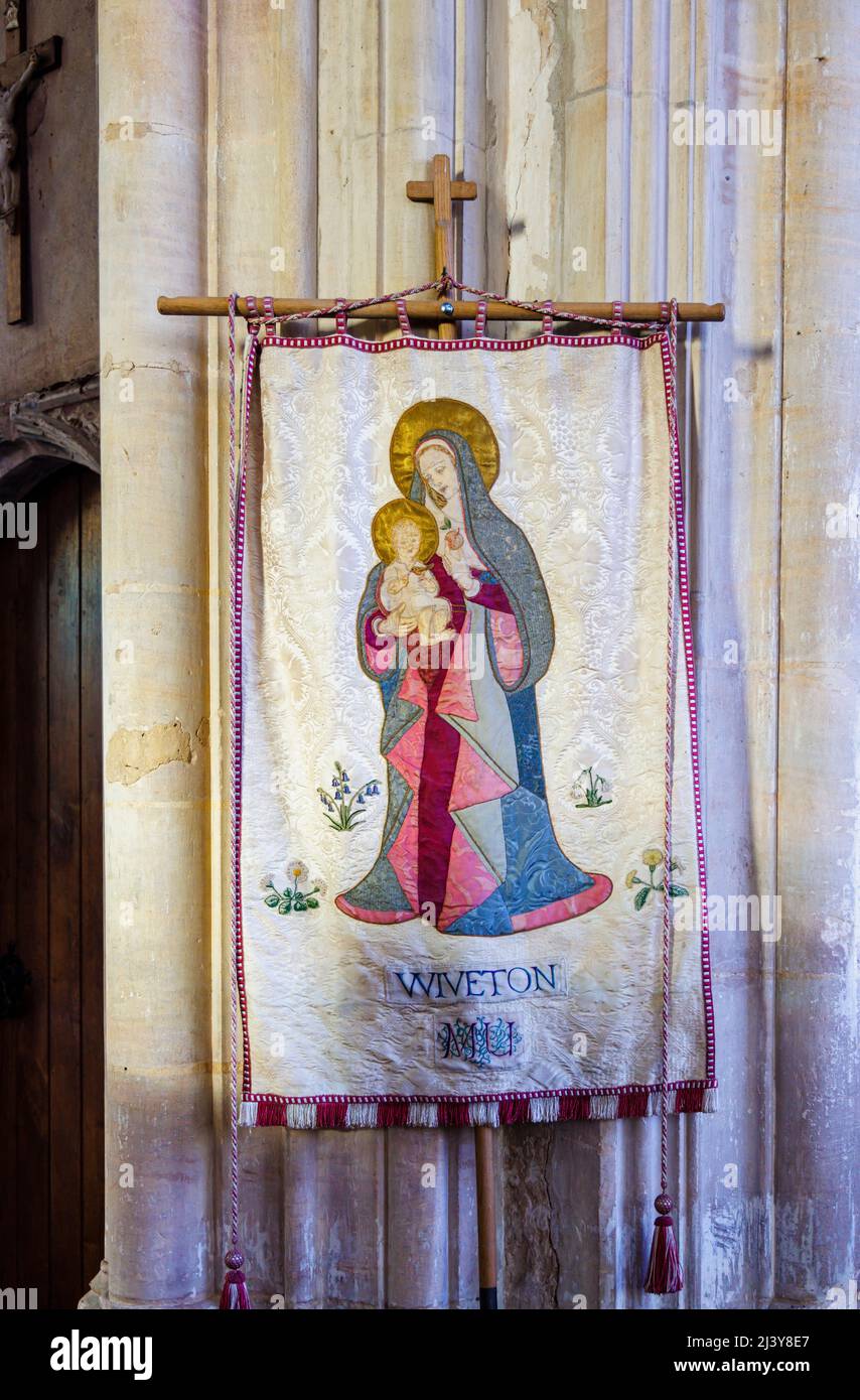 Typical Mothers' Union pole-mounted tapestry banner in St Mary the Virgin Church, Wiveton, a small village in north Norfolk, East Anglia, England Stock Photo