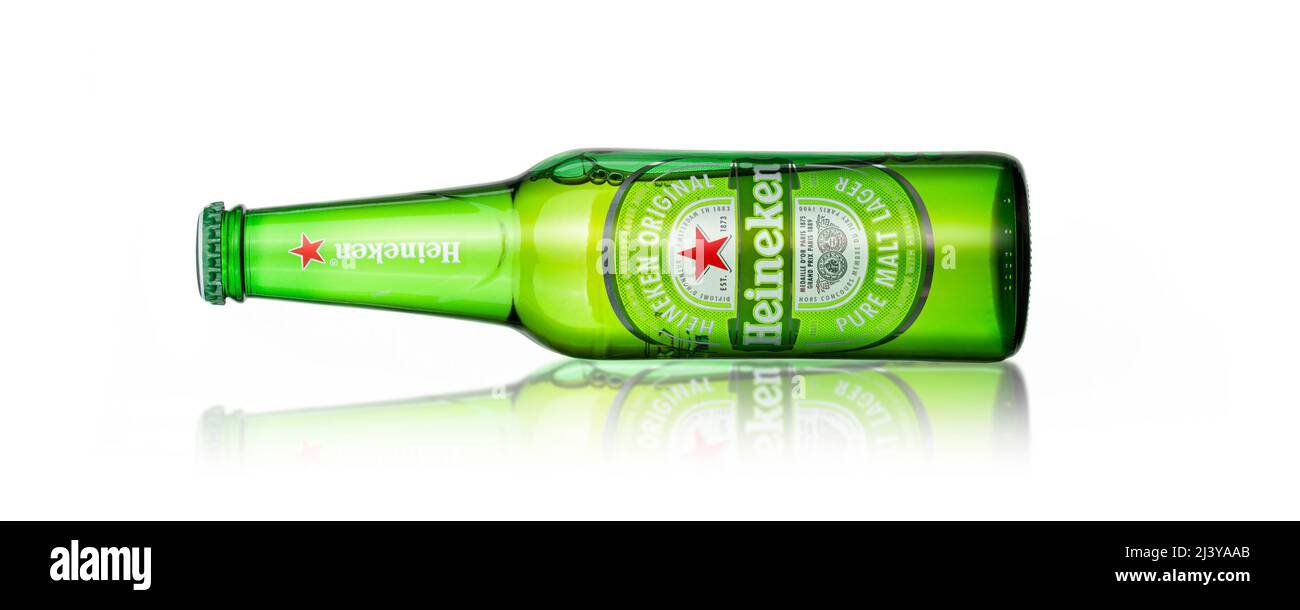 CHISINAU, MOLDOVA - April 9, 2022: Bottle of Heineken Lager Beer on white background. Heineken is the flagship product of Heineken International. With Stock Photo