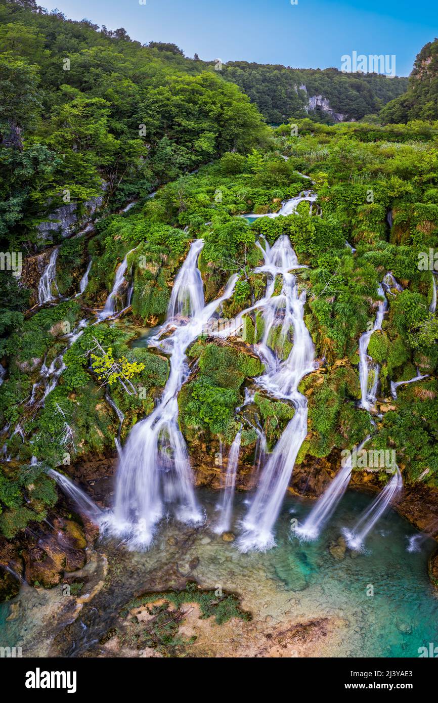 Plitvice, Croatia - Aerial view of the beautiful waterfalls of Plitvice Lakes (Plitvička jezera) in Plitvice National Park on a bright summer day with Stock Photo