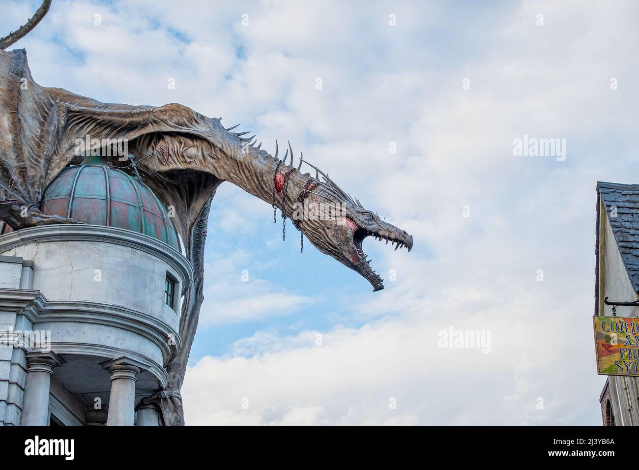 ORLANDO, USA - MARCH 07 2022: The dragon at Gringott Bank at Universal Studios Stock Photo