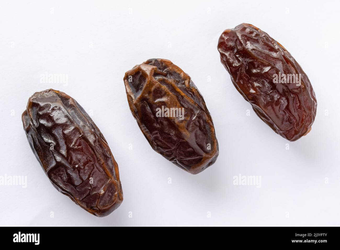 Dates Isolated on White Background Stock Photo