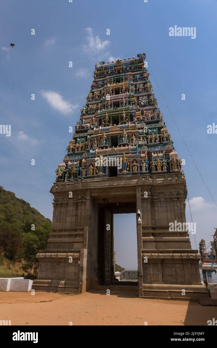 Gopuram (Entrance Tower) at the entrance of Marudhamalai Temple, a 12th century hillside South Indian style Temple, Coimbatore, Tamil Nadu, India Stock Photo