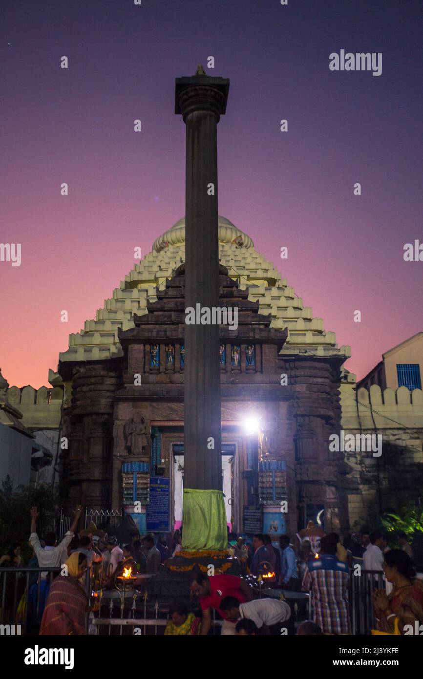 Devotees at the entrance of Main temple dome of Jagannath Temple, dedicated to Jagannath or Lord Vishnu in the coastal town of Puri, Odisha, India. Stock Photo