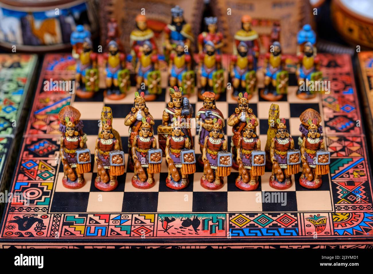 Handcrafted chessboard with Inca and Spanish figurines for sale at Pisac Sunday Market, Pisac town, Peru Stock Photo