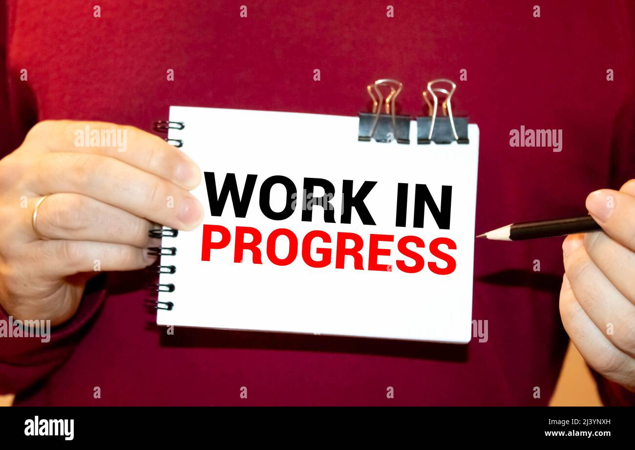Work in Progress text written on a notebook with pencils Stock Photo ...