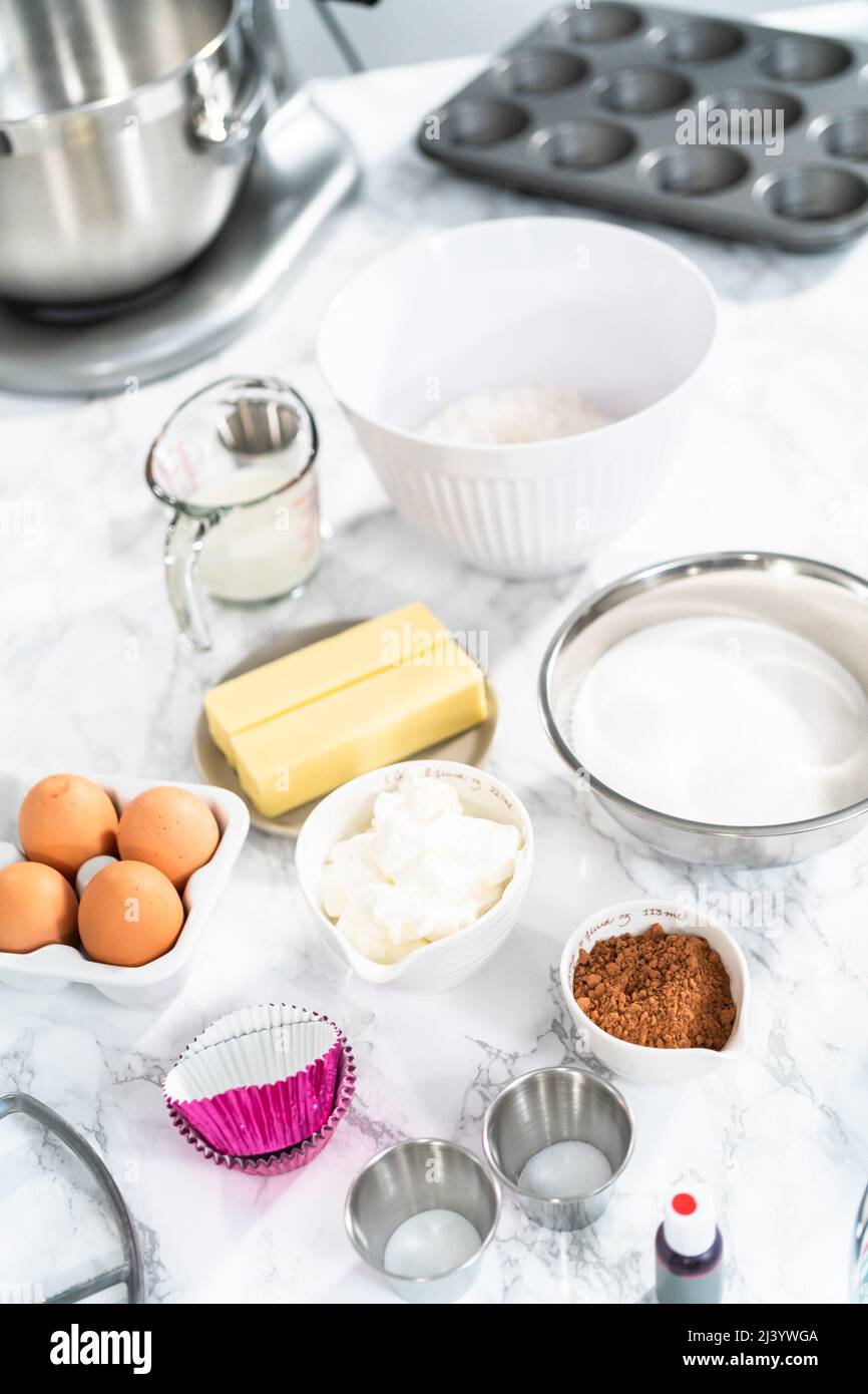 Ingredients to bake red velvet cupcakes Stock Photo Alamy