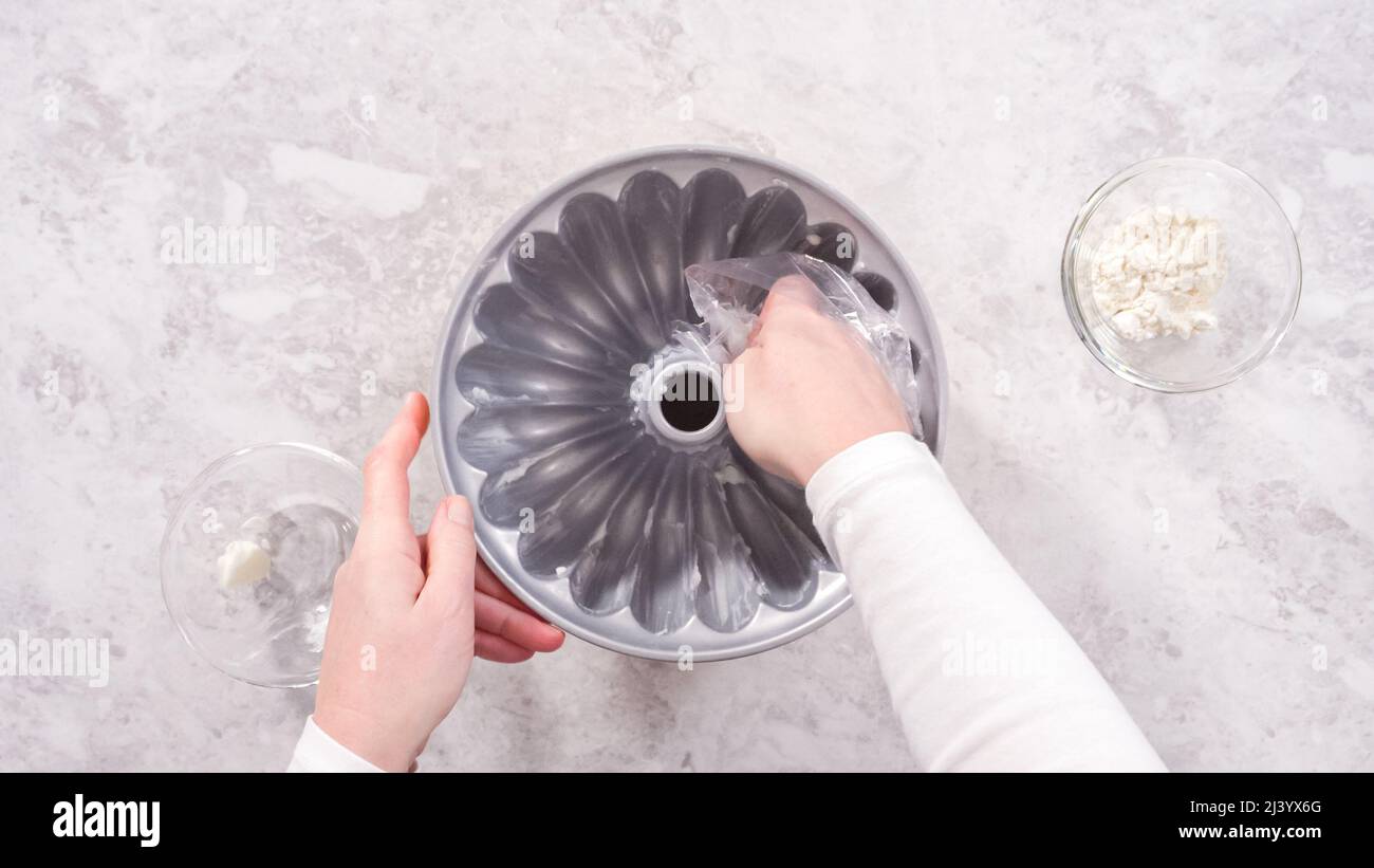 Flat lay. Step by step. Greasing bundt cake pan with vegetable