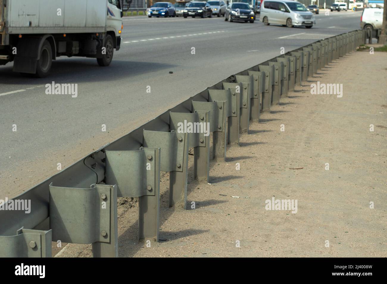 Road bumper. Obstruction on the side of the road. Highway safety. Stock Photo