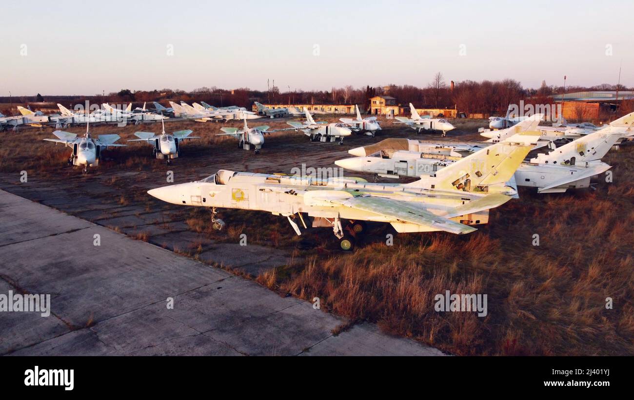 Aerial drone view flight over parking lot of old dismantled aircraft ...