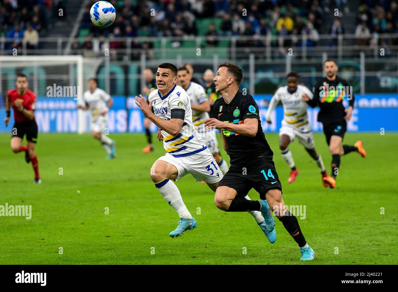 Milano, Italy. 09th, April 2022. Ivan Perisic (14) of Inter and Bosko Sutalo (31) of Verona seen in the Serie A match between Inter and Hellas Verona at Giuseppe Meazza in Milano. (Photo credit: Gonzales Photo - Tommaso Fimiano). Stock Photo