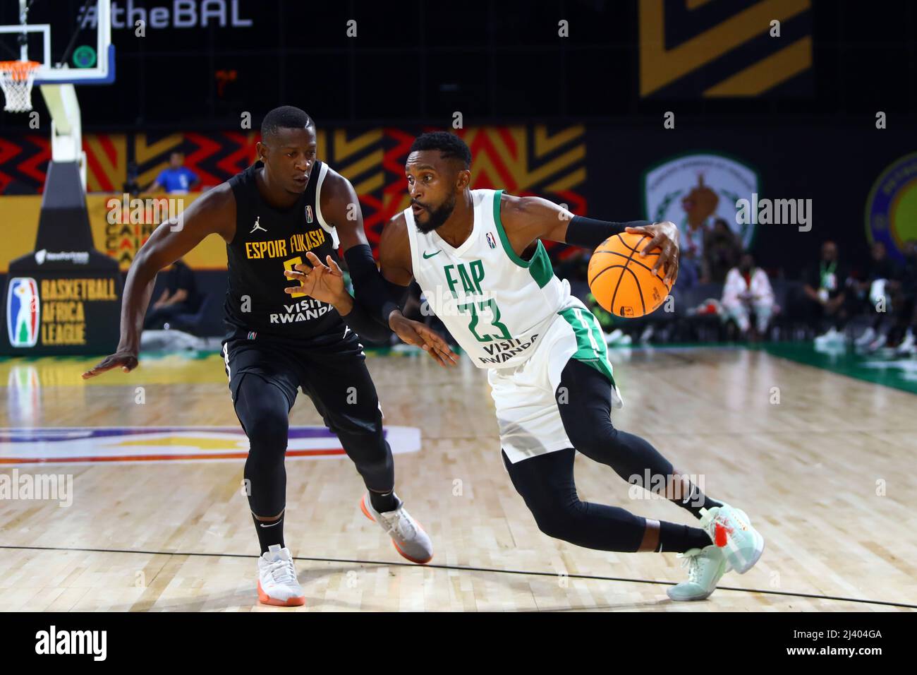 Cairo, Egypt. 10th Apr, 2022. Pierre Cedric Essome (R) of Forces Armees et Police Basketball dribbles the ball during the match between Forces Armees et Police Basketball (FAP) of Cameroon and BC Espoir Fukash of Congo at the 2022 Basketball Africa League (BAL) in Cairo, Egypt, on April 10, 2022. Credit: Ahmed Gomaa/Xinhua/Alamy Live News Stock Photo