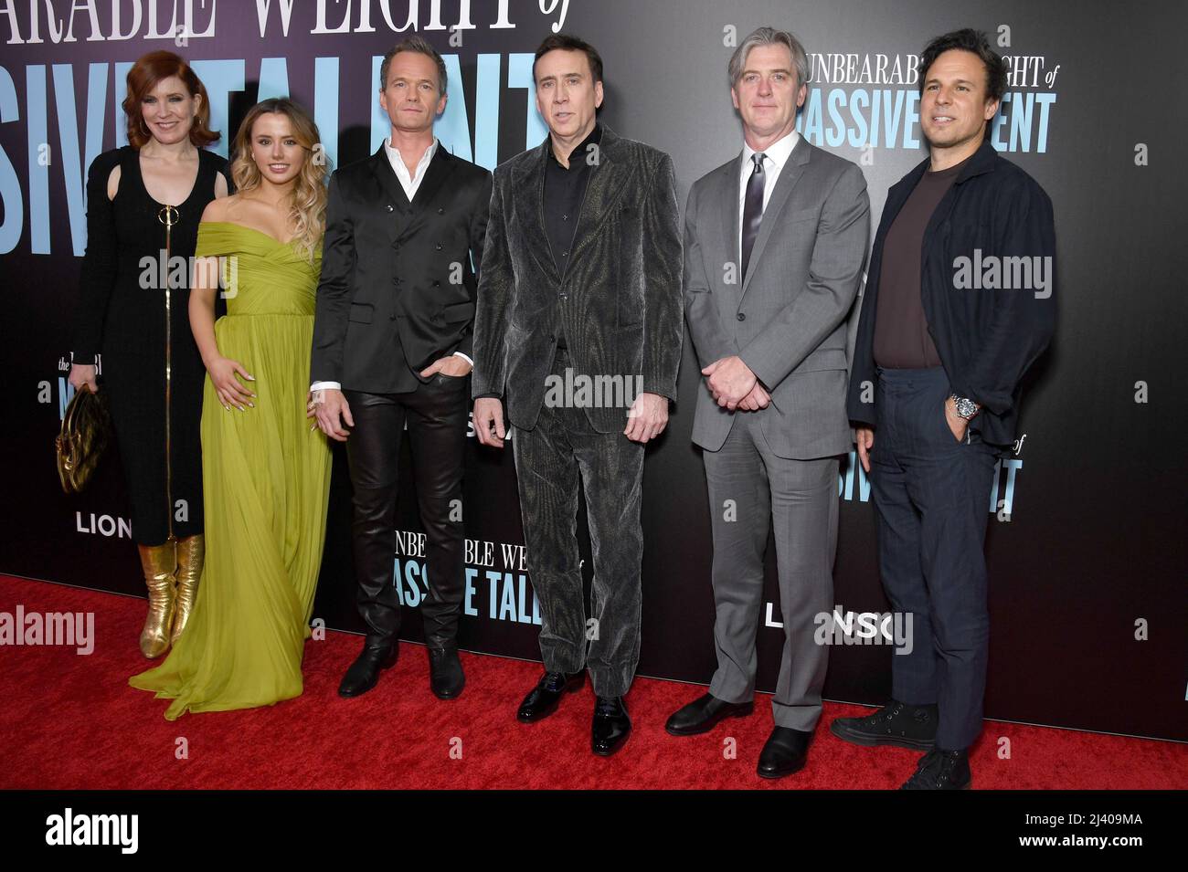 New York, USA. 10th Apr, 2022. (L-R) Kristin Burr, Lily Sheen, Neil Patrick Harris, Nicolas Cage, and Kevin Turen attend the New York premiere of 'The Unbearable Weight of Massive Talent' at Regal Essex Crossing in New York, NY, April 10, 2022. (Photo by Anthony Behar/Sipa USA) Credit: Sipa USA/Alamy Live News Stock Photo