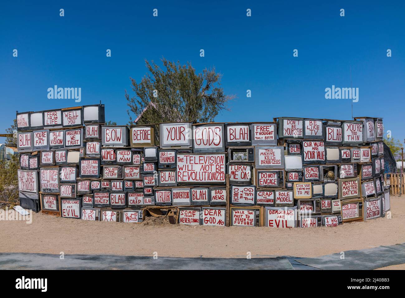 The 'TV Wall' by artist Flip Cassidy in the off-the-grid artist community of East Jesus in the Sonoran Desert near the Salton Sea in Southern Californ Stock Photo