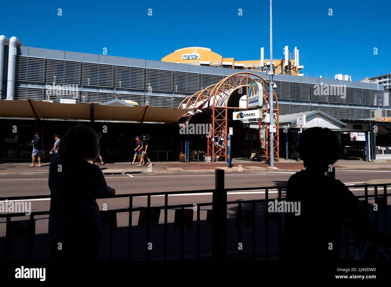 People walk along Mitchell street in Darwin, Northern Territory, Australia. Stock Photo