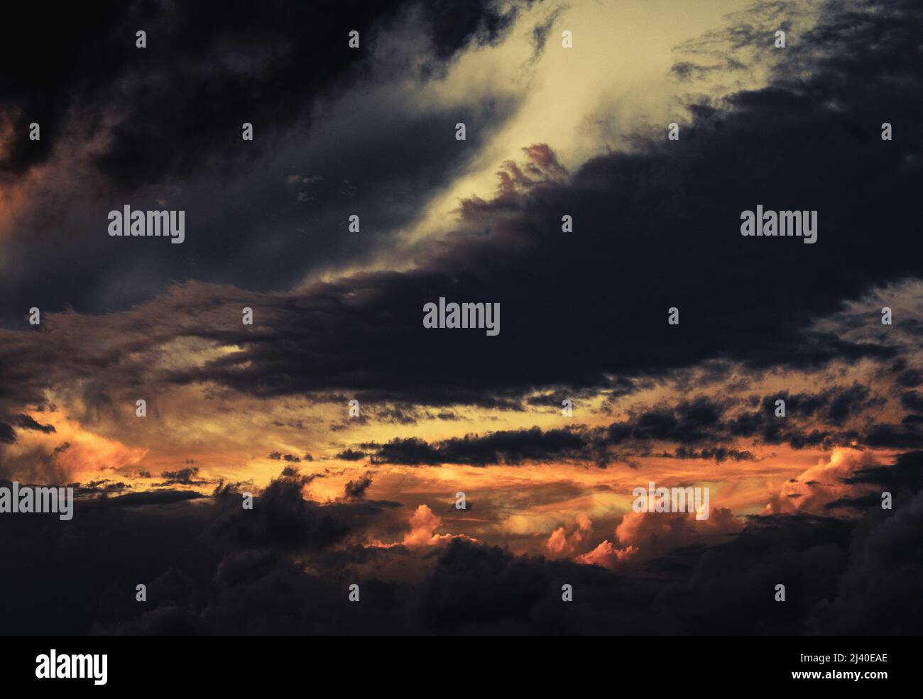 dramatic sunset stormy cloudy sky, background Stock Photo