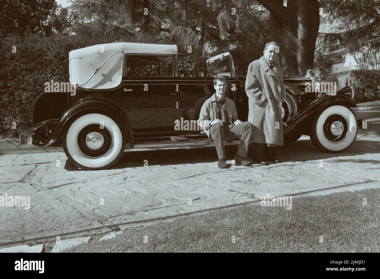 Phil Hill with son Derek. Car 1931 Pierce Arrow Le Baron Stock Photo