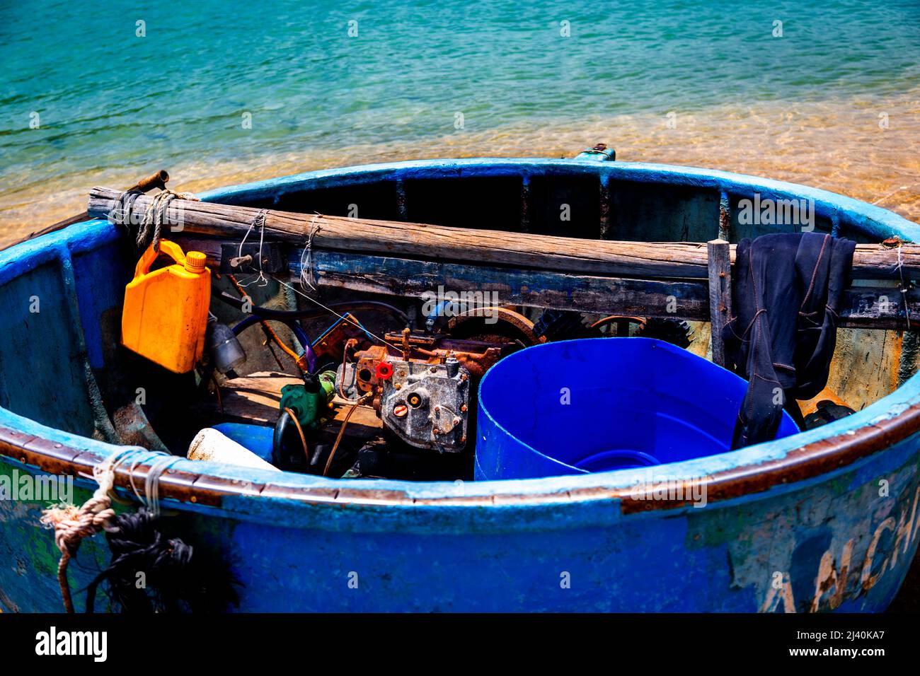 Round fishing boat equipped with fishing gear for night fishing