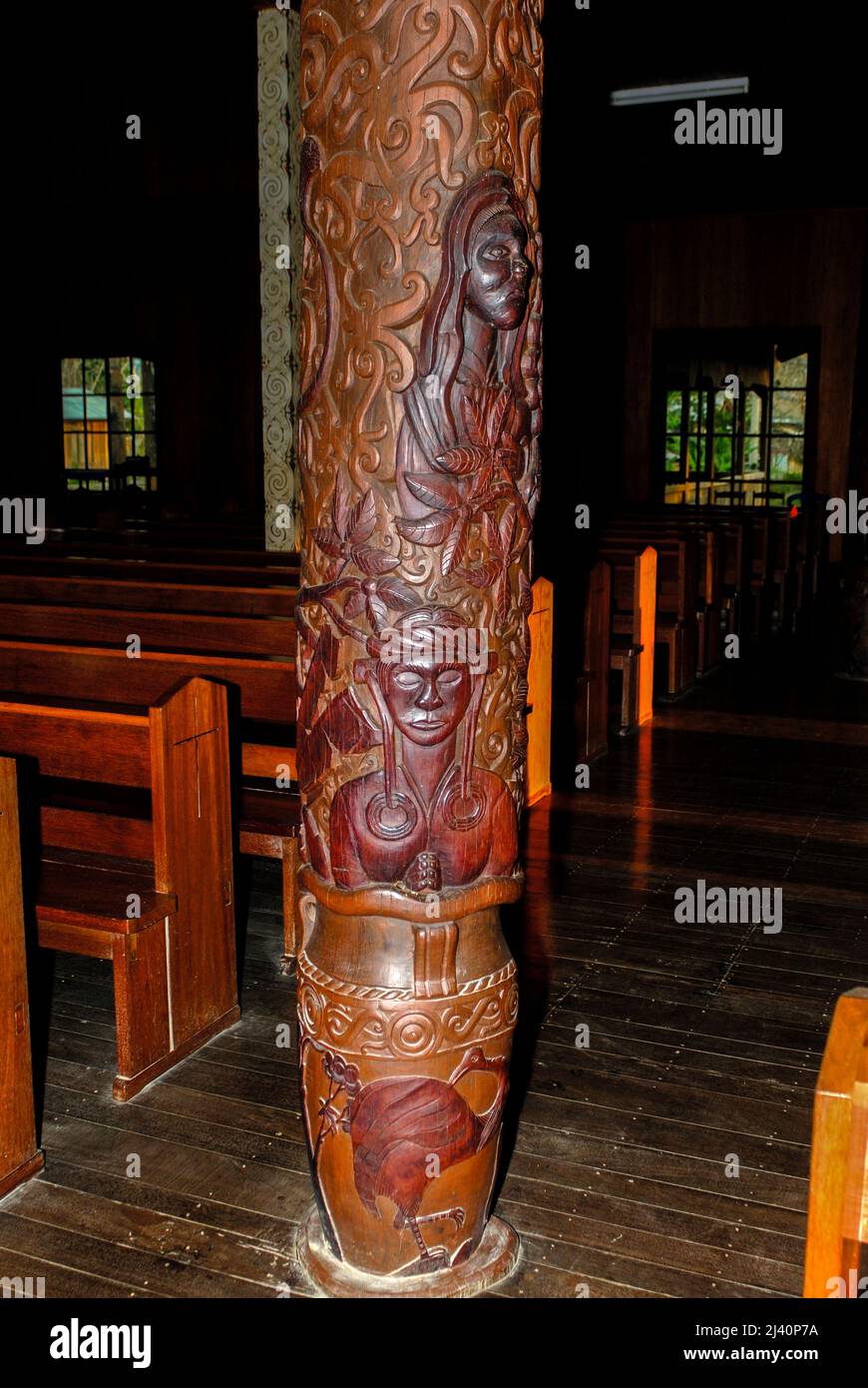 Dayak interpretations of biblical scenes in the church in the small village of Tering.  All local materials and craftsmen. Stock Photo