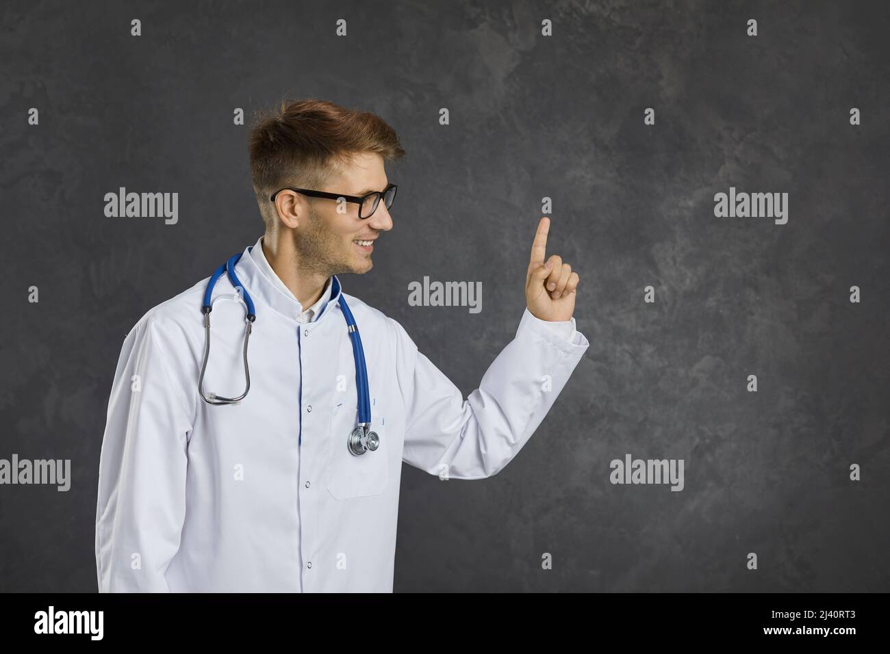 Happy male doctor recommend good health insurance offer Stock Photo