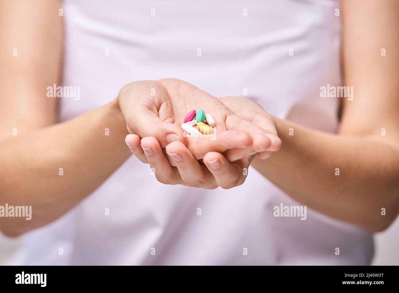 Woman eat pregnancy pills. Flu supplements. Taking allergy drugs