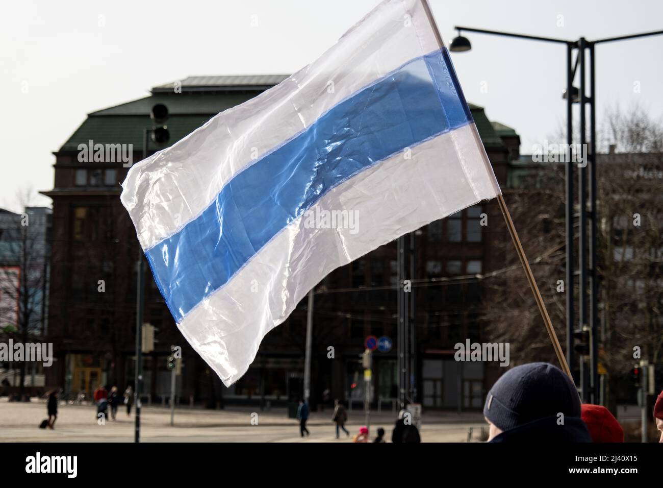 Russian anti-war white-blue-white flag in Helsinki Stock Photo