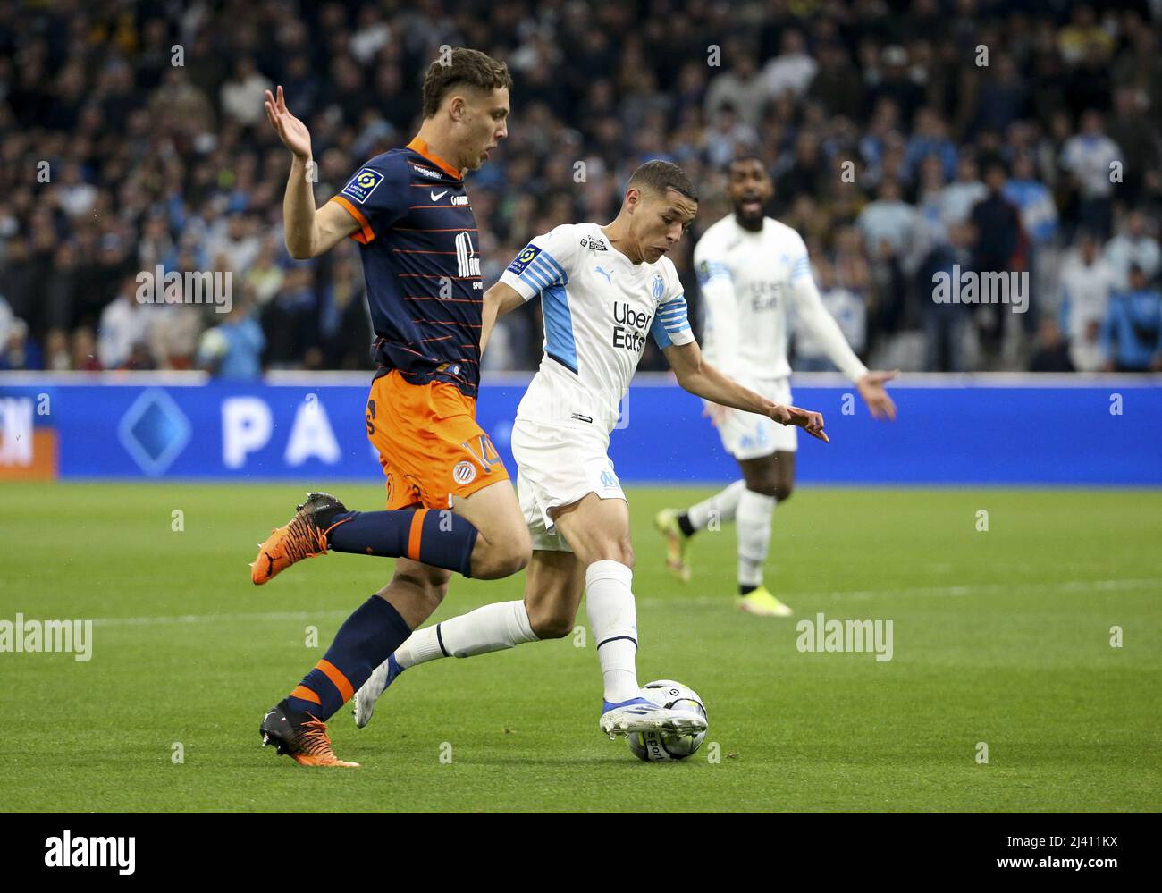 Amine Harit of Marseille, Maxime Esteve of Montpellier (left) during the  French championship Ligue 1 football match between Olympique de Marseille  (OM) and Montpellier HSC (MHSC) on April 10, 2022 at Stade