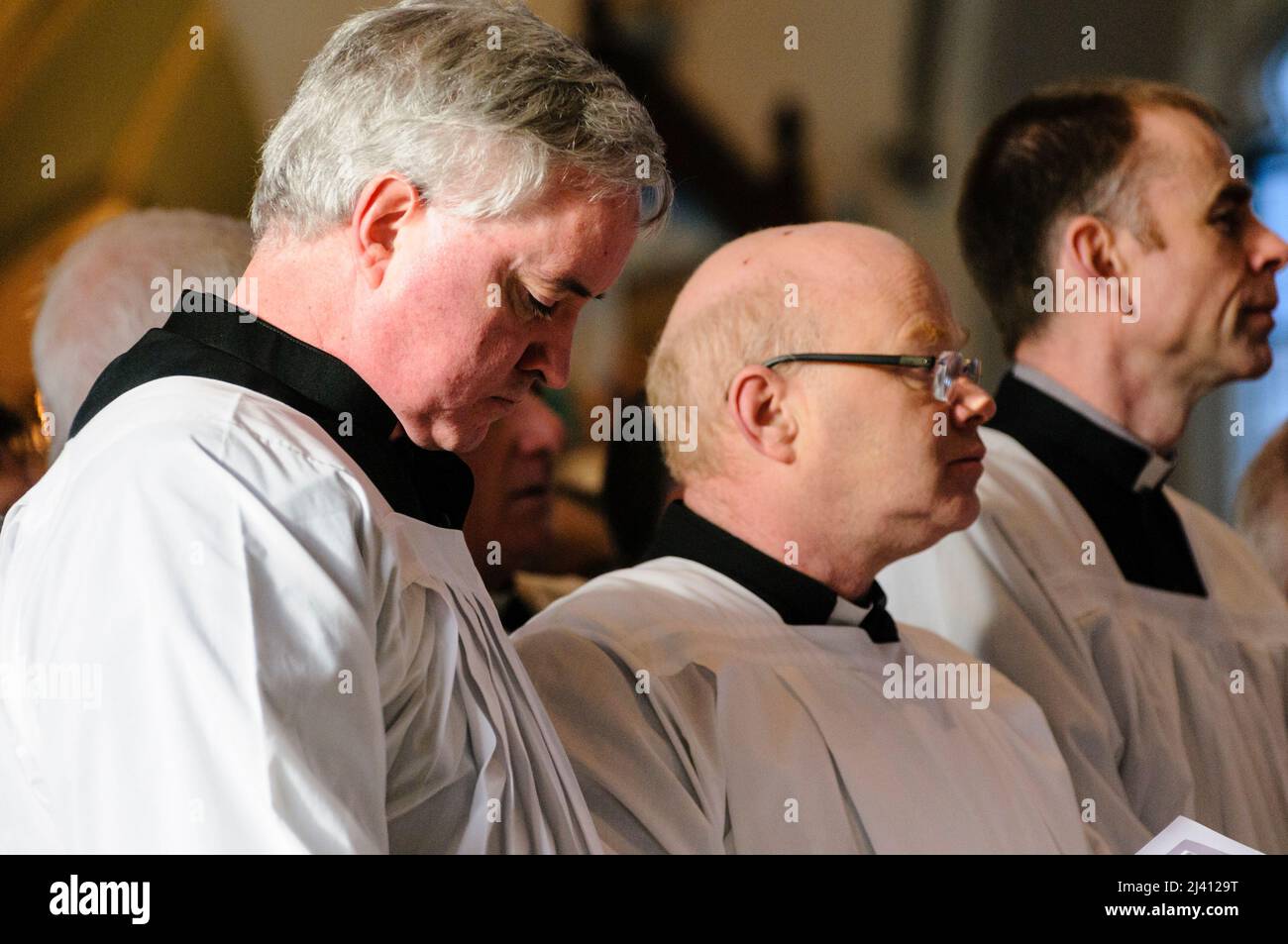 Belfast, Northern Ireland. 2nd January 2010. Priests gather for the requiem mass of Cardinal Cahal Daly at Saint Peter's Cathedral. Stock Photo