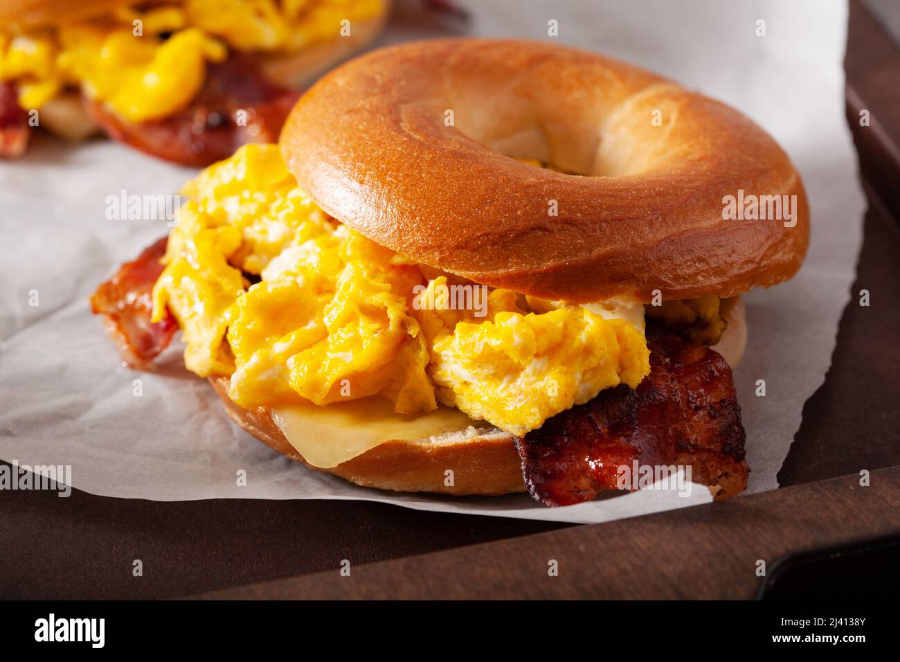 breakfast egg and bacon sandwich on bagel with cheese Stock Photo - Alamy