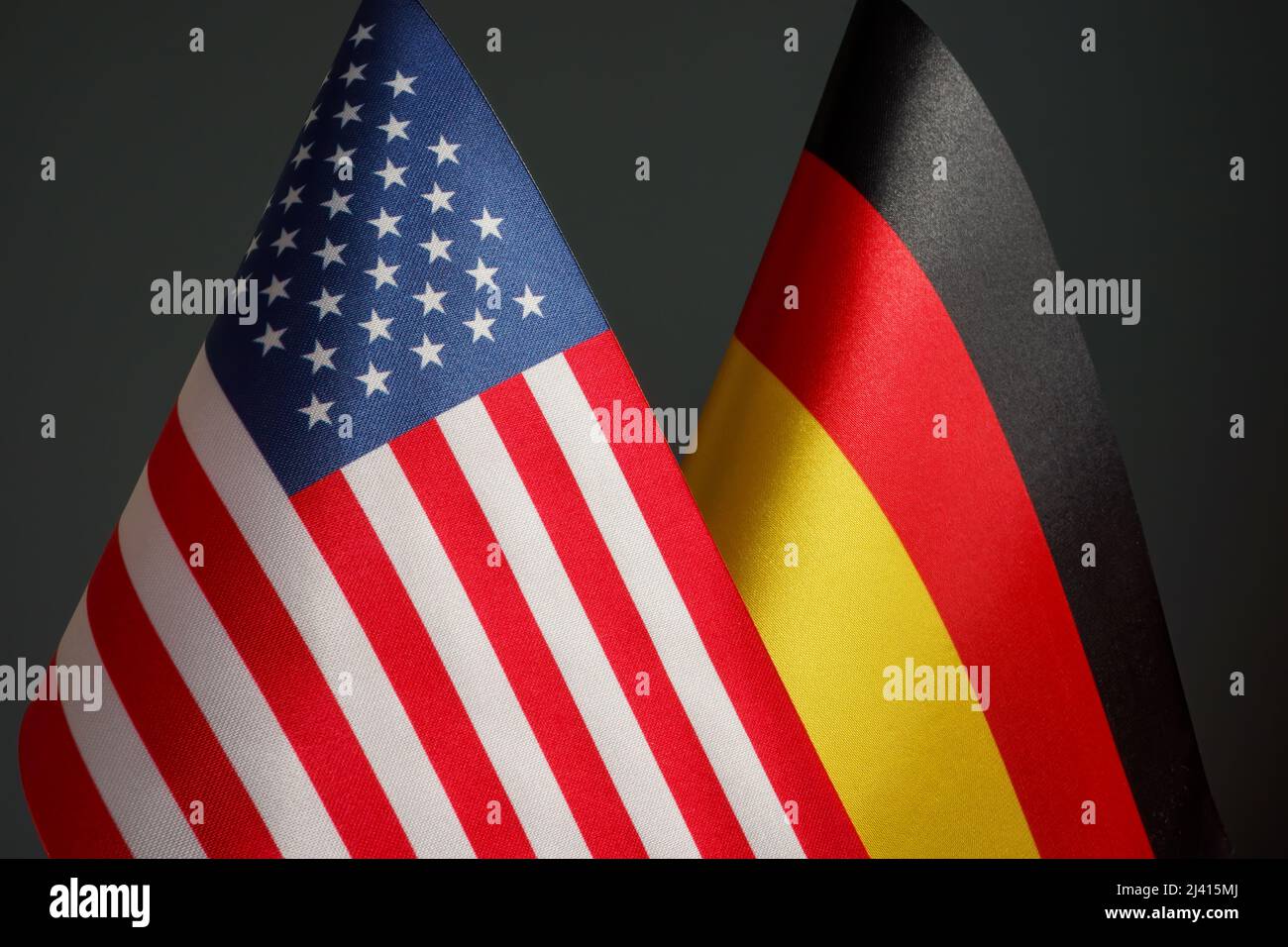 Flags of the USA and Germany as a symbol of political relations. Stock Photo