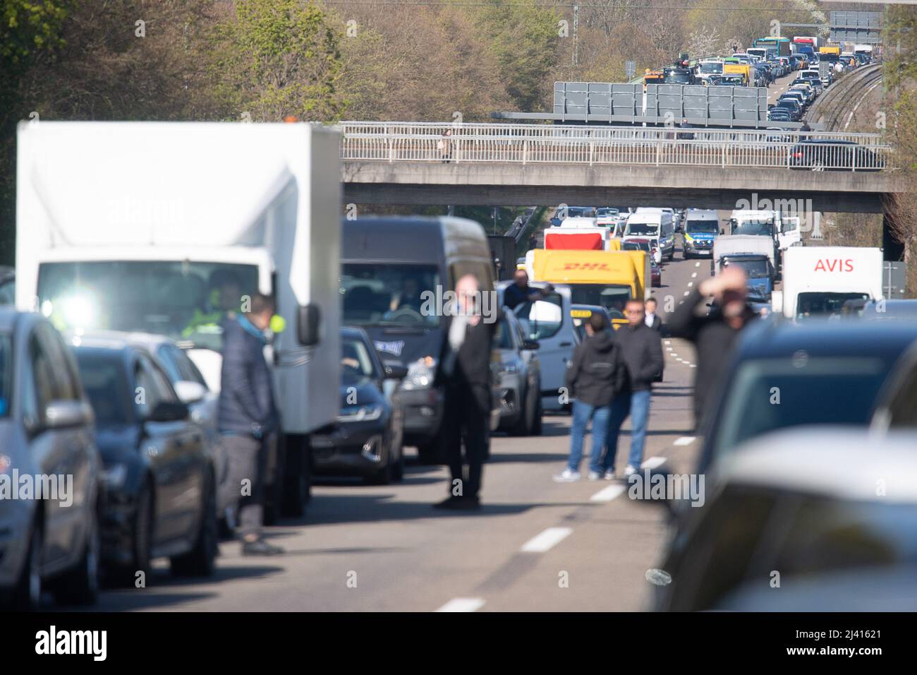 11 April 2022, Hessen, Frankfurt/Main: Cars jam the A66 during a blockade  action by the "Last Generation" protest group. The group demands, among  other things, a stop to all investments in the