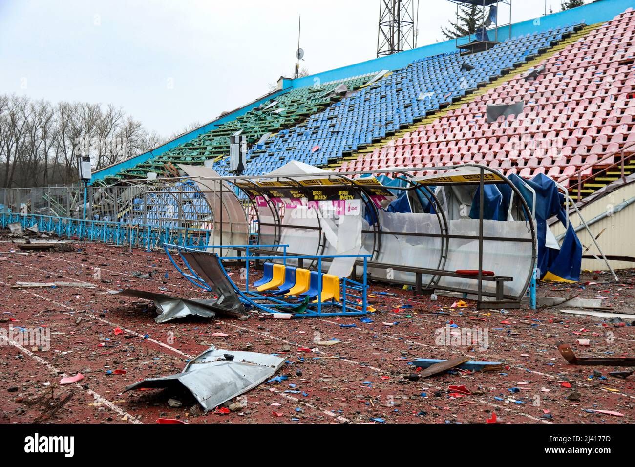 CHERNIHIV, UKRAINE - APRIL 9, 2022 - The damaged stands and tracks are pictured at the Chernihiv Olympic Sports Training Centre (formerly Yuri Gagarin Stock Photo