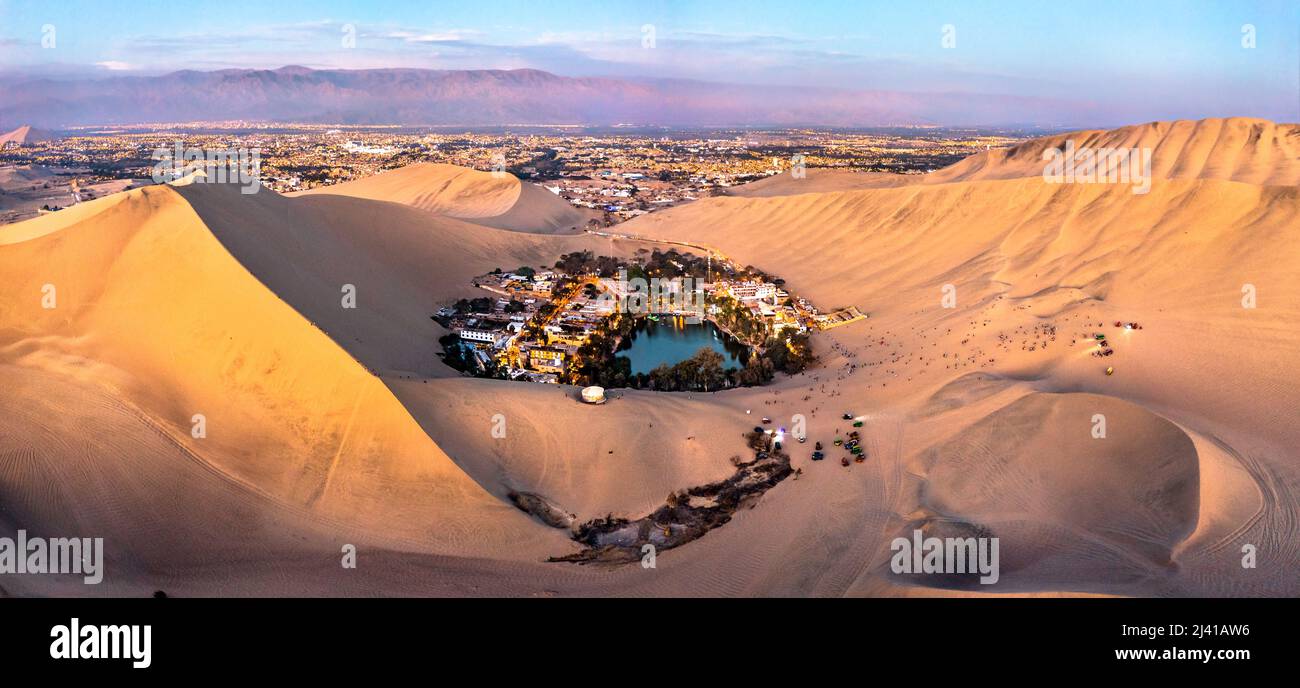 Aerial Sunset View Of The Huacachina Oasis In The Atacama Desert Of Aerial Sunset View Of The Huacachina Oasis In The Atacama Desert Of