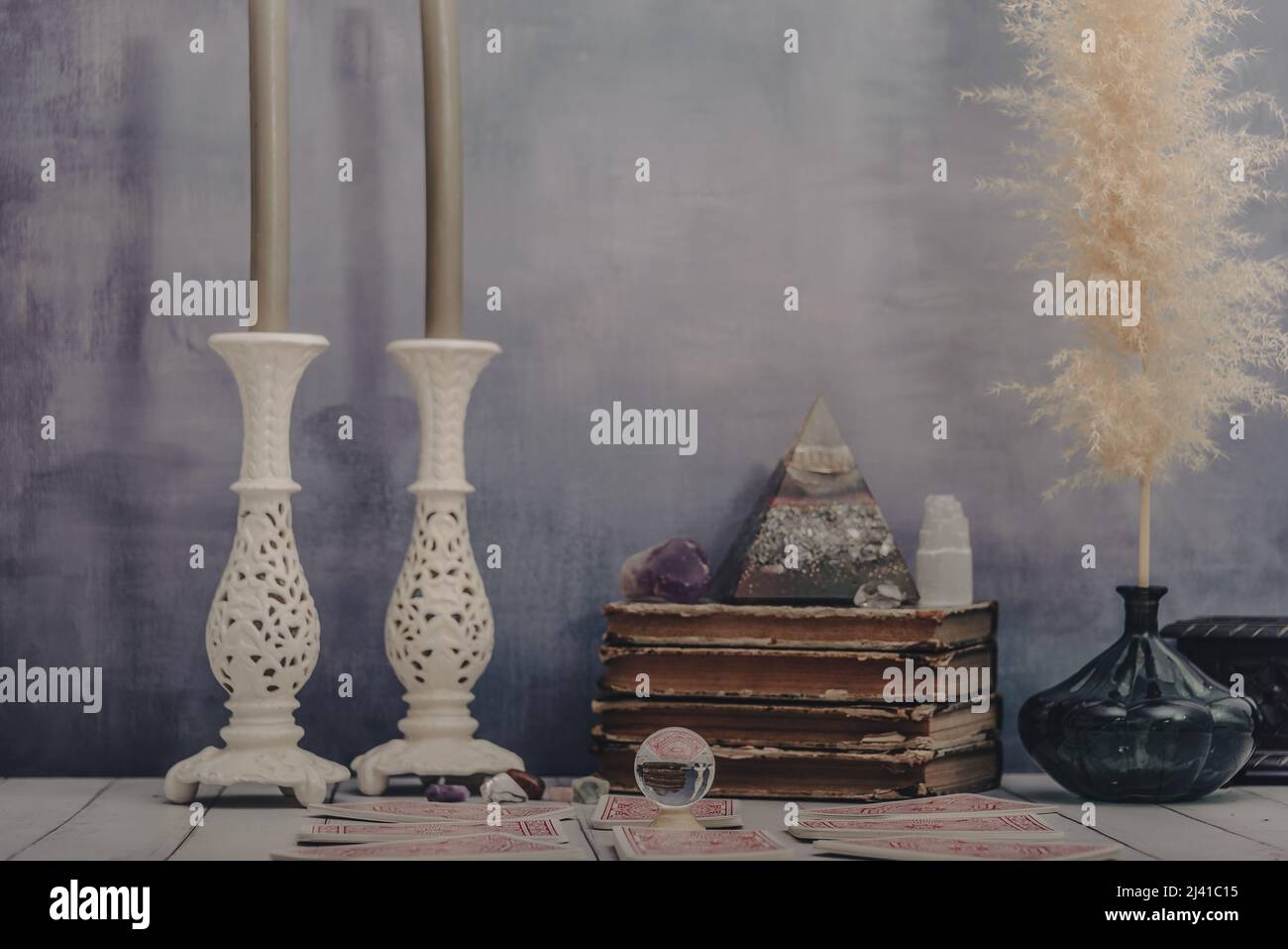 Fortune telling a deck of tarot cards with other fortune telling items