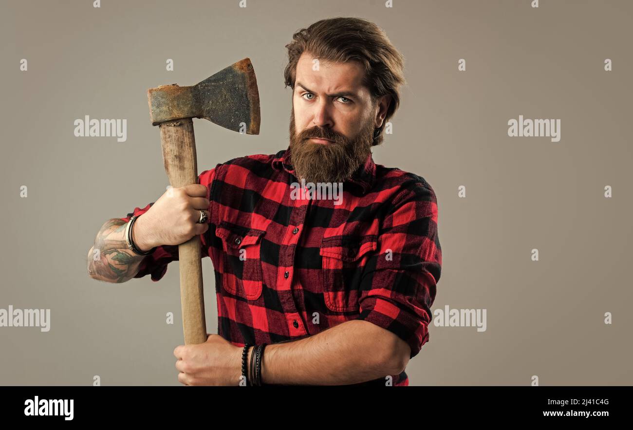 handsome bearded guy with beard and moustache hold ax, woodsman Stock ...