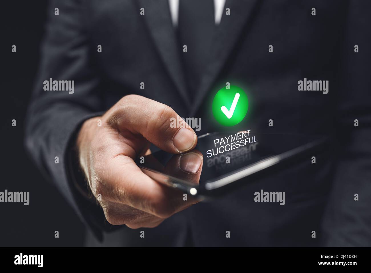 Smartphone online payment successful, businessman using mobile smart phone app to pay on internet, closeup with selective focus Stock Photo