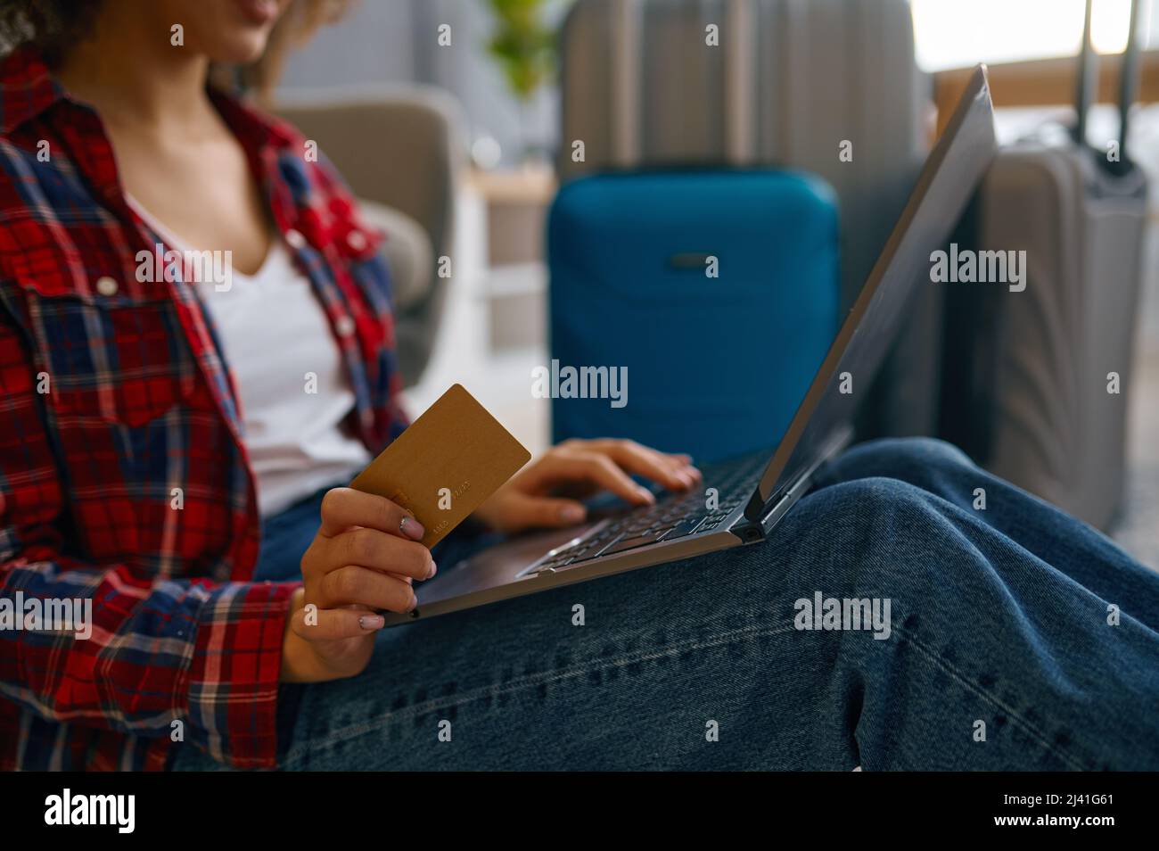 Closeup woman booking trip making purchase online Stock Photo