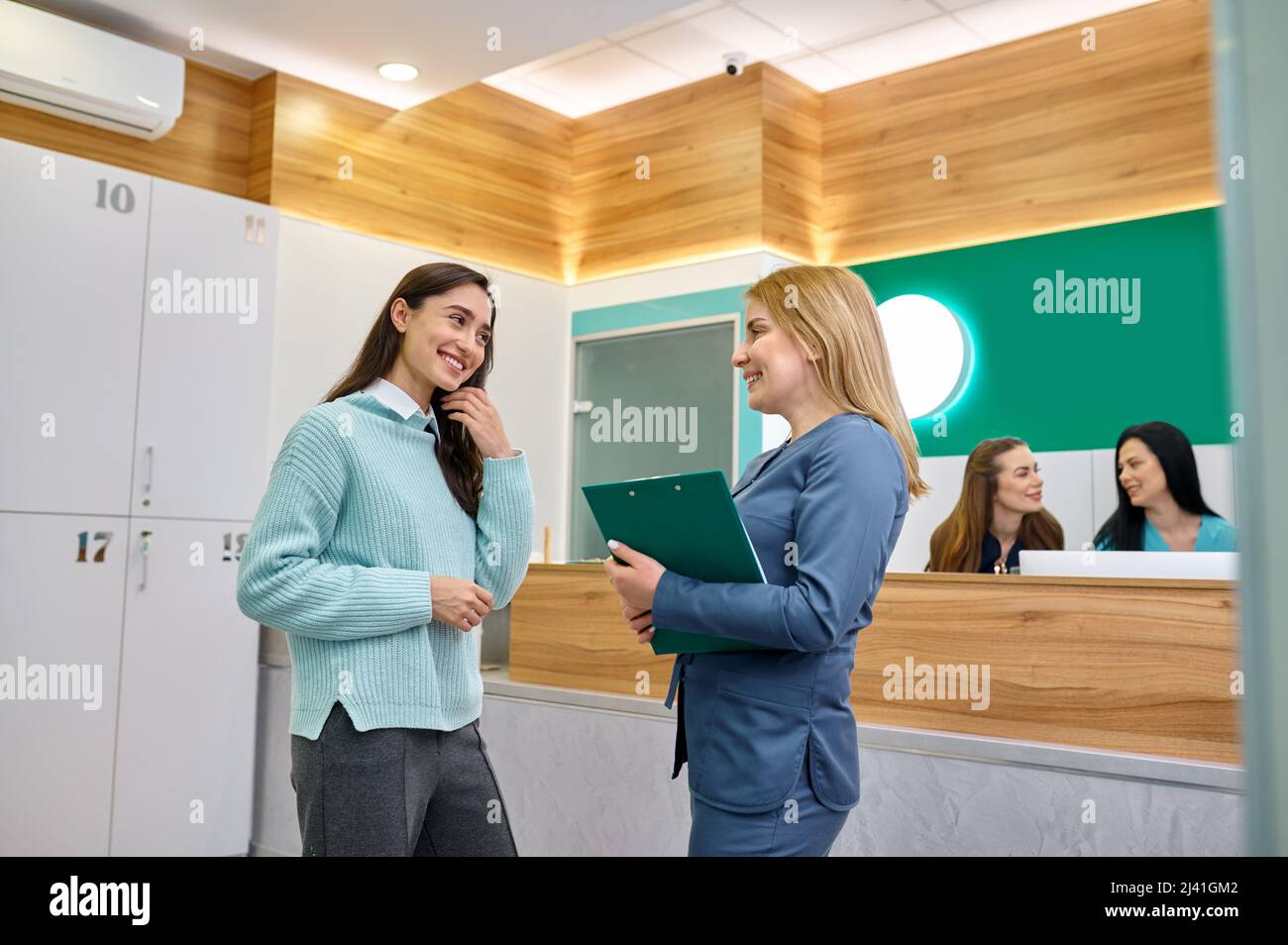 Female doctor and patient discussing medical prescription Stock Photo