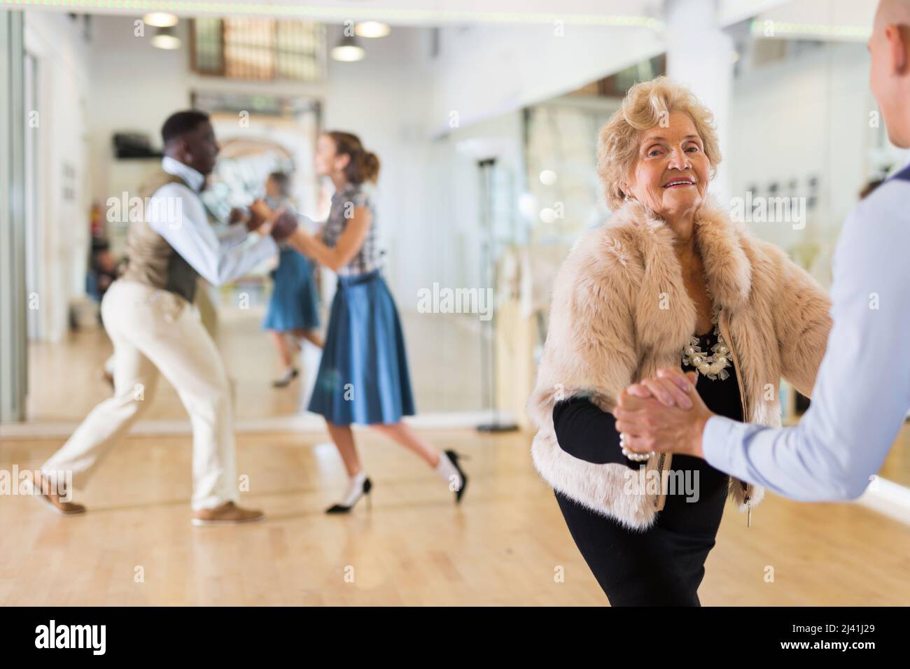 Mature woman dancing club hi-res stock photography and images - Alamy