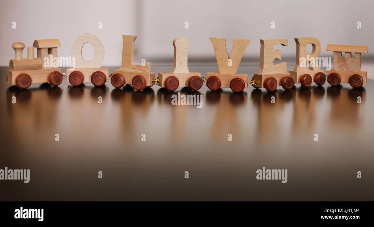 wooden toy train with name Oliver Stock Photo Alamy