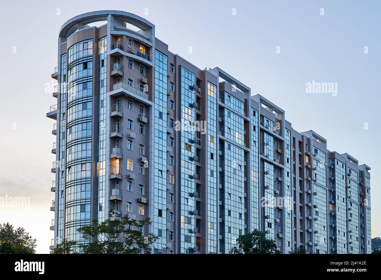 Multi-storey residential modern house against the blue sky Stock Photo ...
