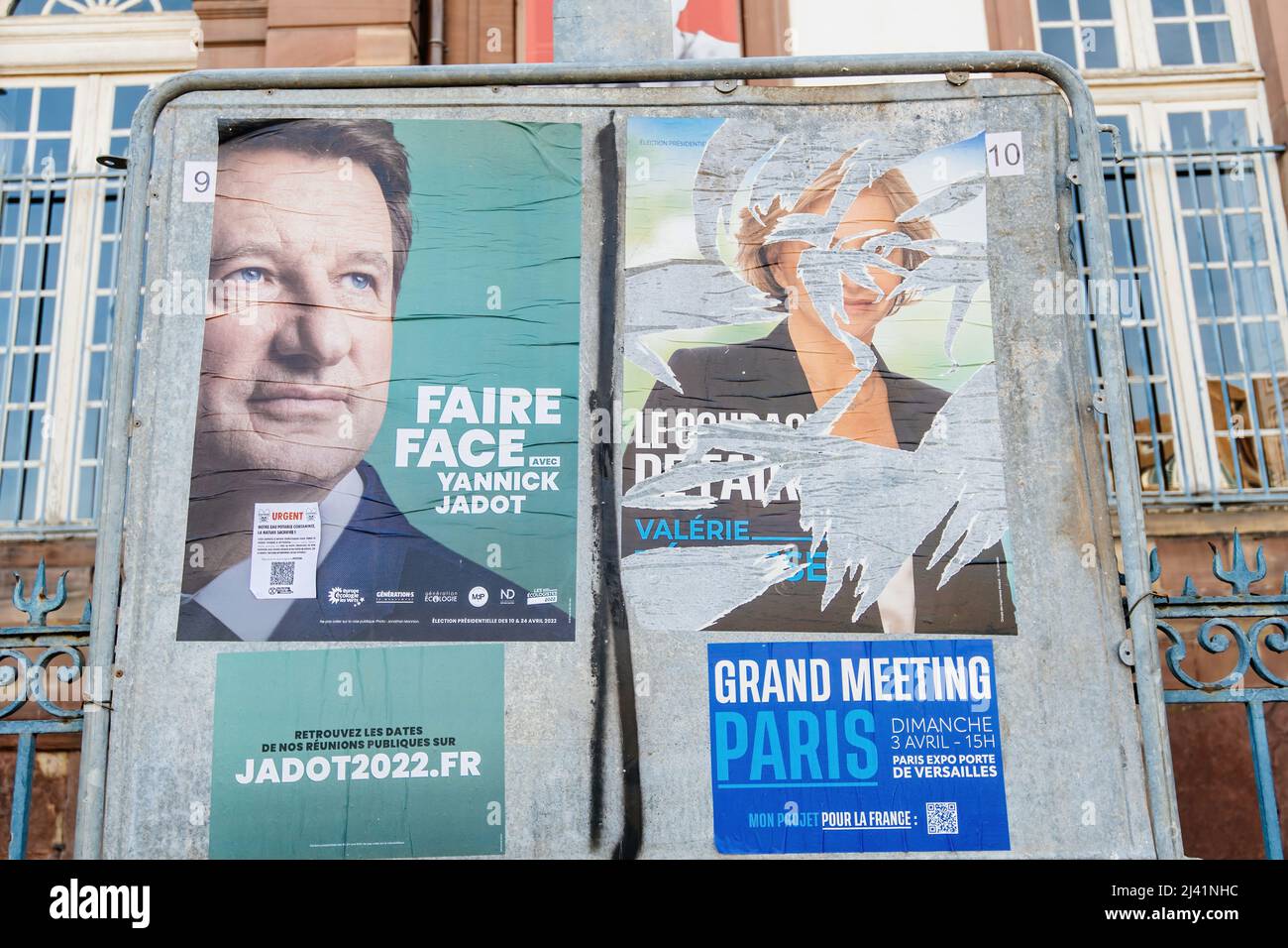 STRASBOURG, FRANCE - APR 23, 2022: French presidential posters for the upcoming presidential election in France, in front of the City Hall building in Strasbourg featuring Valerie Petrasse and Yannick Jadot Stock Photo