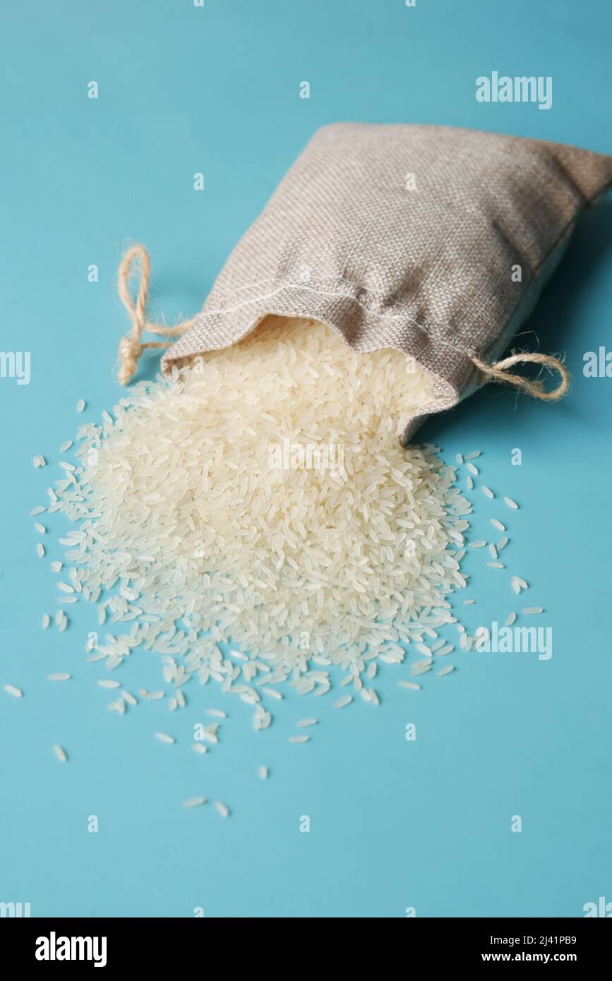 Rice in a bag on table cloth, Top view Stock Photo - Alamy