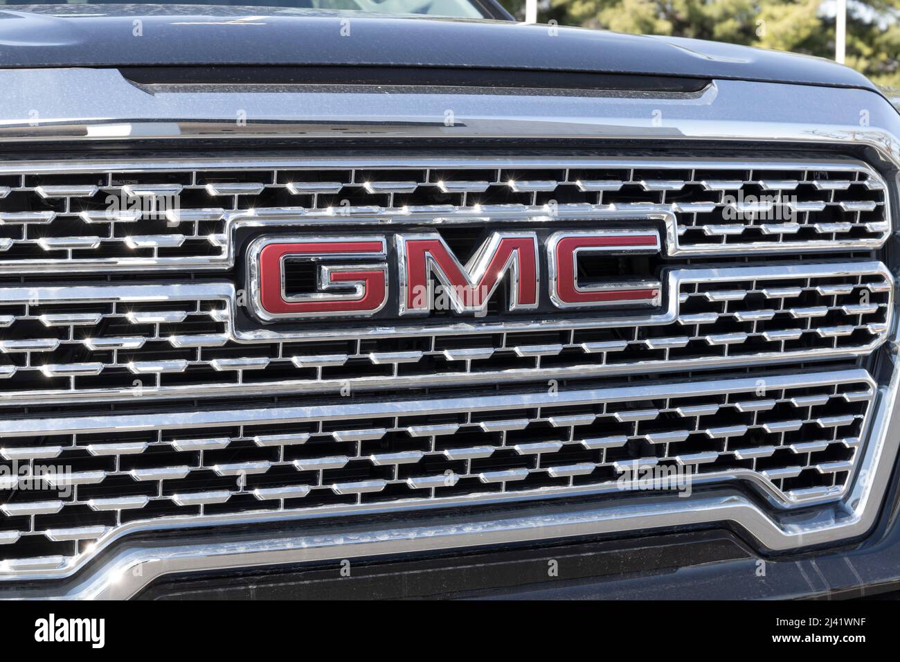 Kokomo - Circa April 2022: GMC Truck and SUV dealership. GMC and Buick are divisions of General Motors. Stock Photo