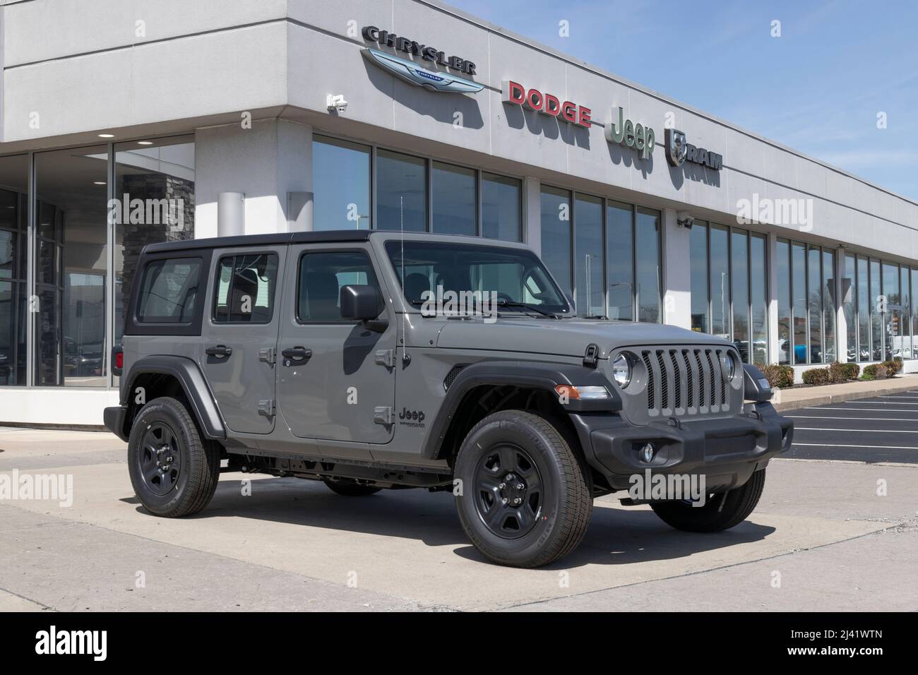 Kokomo - Circa April 2022: Jeep Wrangler display at a Stellantis  dealership. Jeep offers the Wrangler in Sport, Sahara, and Rubicon models  Stock Photo - Alamy