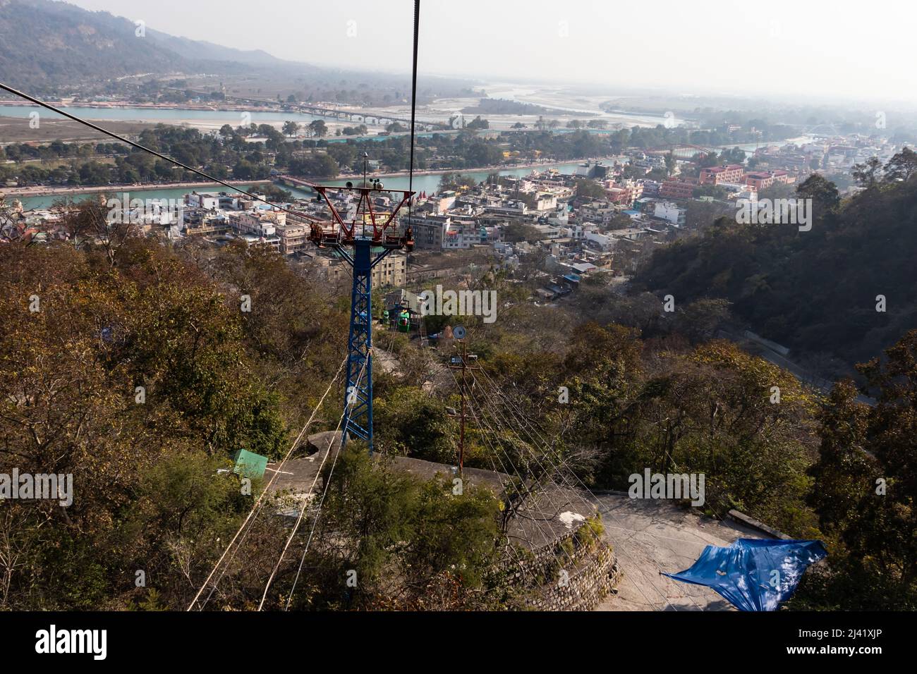 rope way with city view at day from top angle image is taken at Mansa Devi Temple rope way haridwar uttrakhand india. Stock Photo