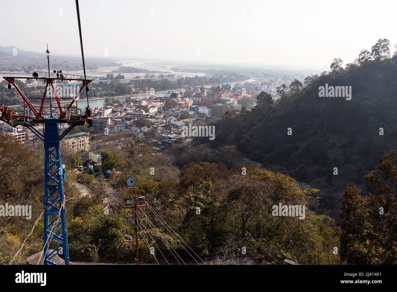 rope way with city view at day from top angle image is taken at Mansa Devi Temple rope way haridwar uttrakhand india. Stock Photo