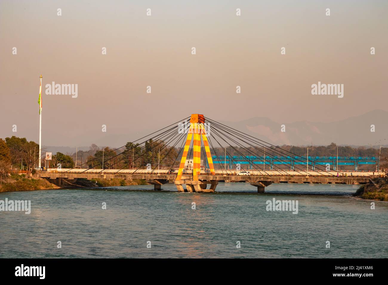 isolated cable bridge over ganges river at evening image is taken at haridwar uttrakhand india. Stock Photo