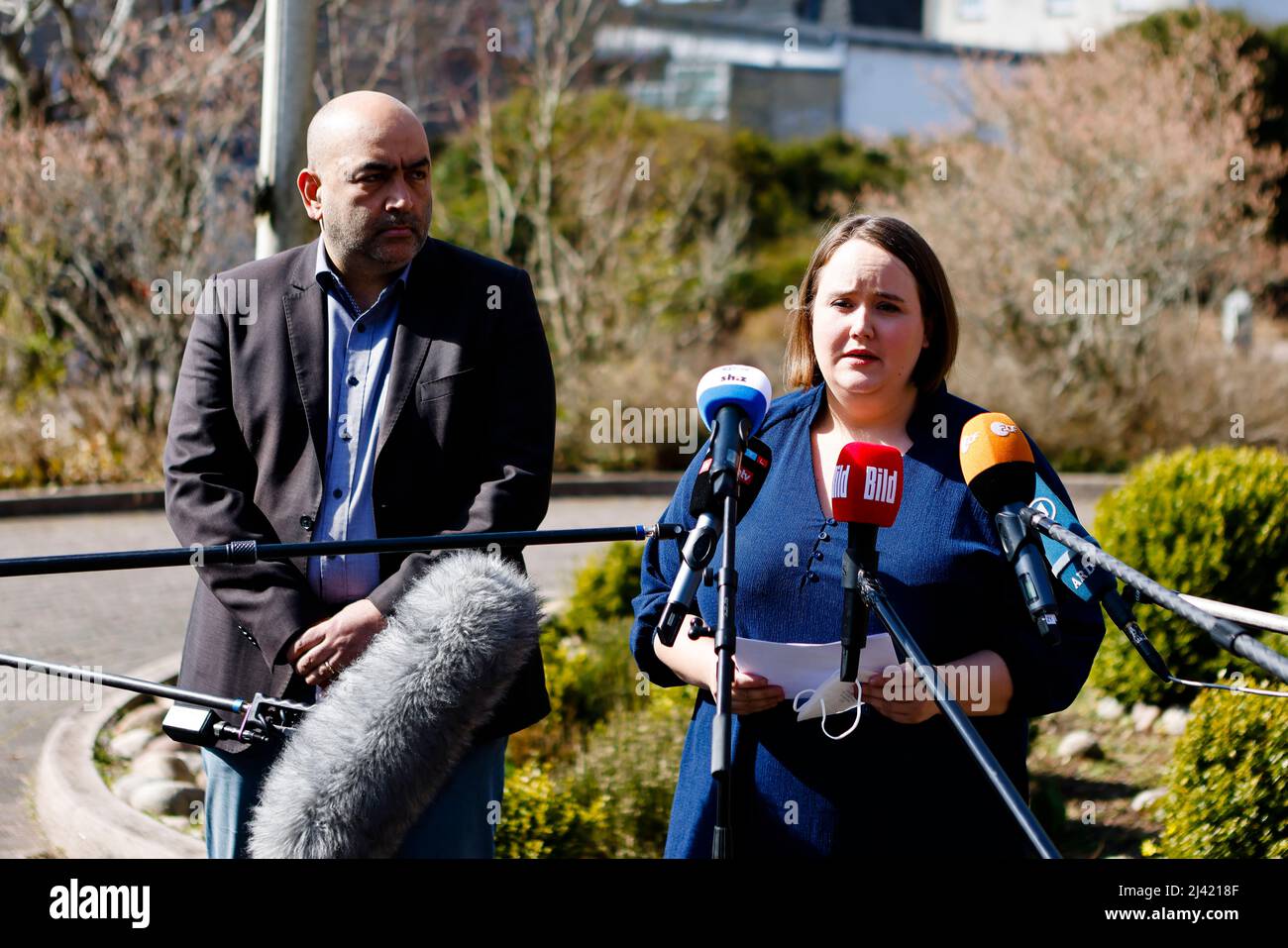 Husum, Germany. 11th Apr, 2022. Ricarda Lang (l-r), federal chairwoman of Bündnis 90/Die Grünen, and Omid Nouripour, federal chairman of Bündnis 90/Die Grünen, arrive for a press meeting. The Green Party leadership wants to make a proposal for the successor to the resigned Family Minister Spiegel (Greens) in a timely manner. This said co-party leader Omid Nouripour on Monday in Husum Credit: Frank Molter/dpa/Alamy Live News Stock Photo