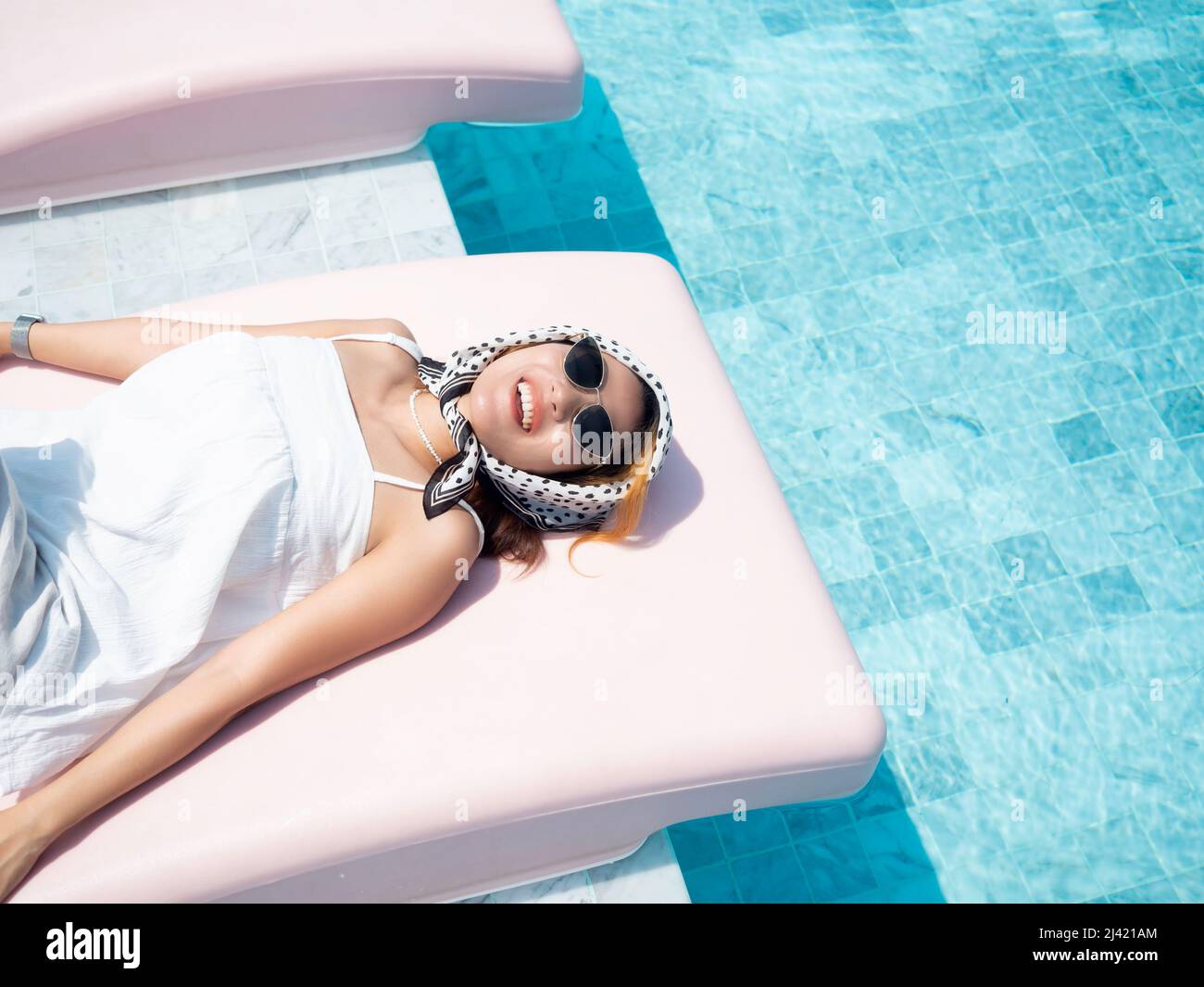 Thai woman swimming pool hi-res stock photography and images - Alamy