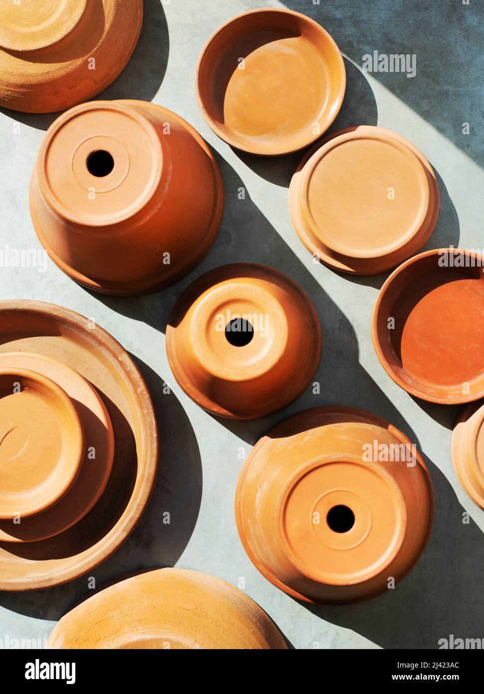 Collection of terra cotta pots and plates Stock Photo